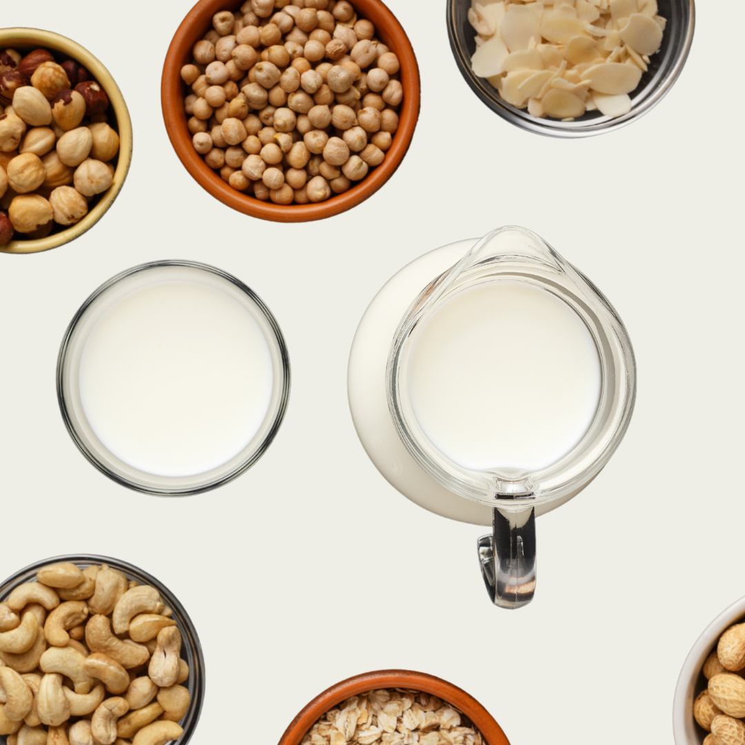 A photo of nuts and a pitcher of milk